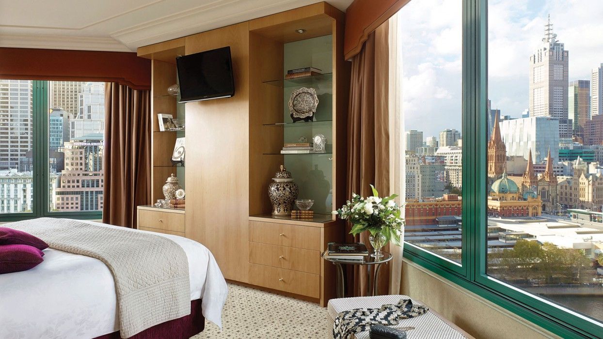 The Langham Melbourne Hotel Exterior photo A bedroom at the Mandarin Oriental, Hong Kong